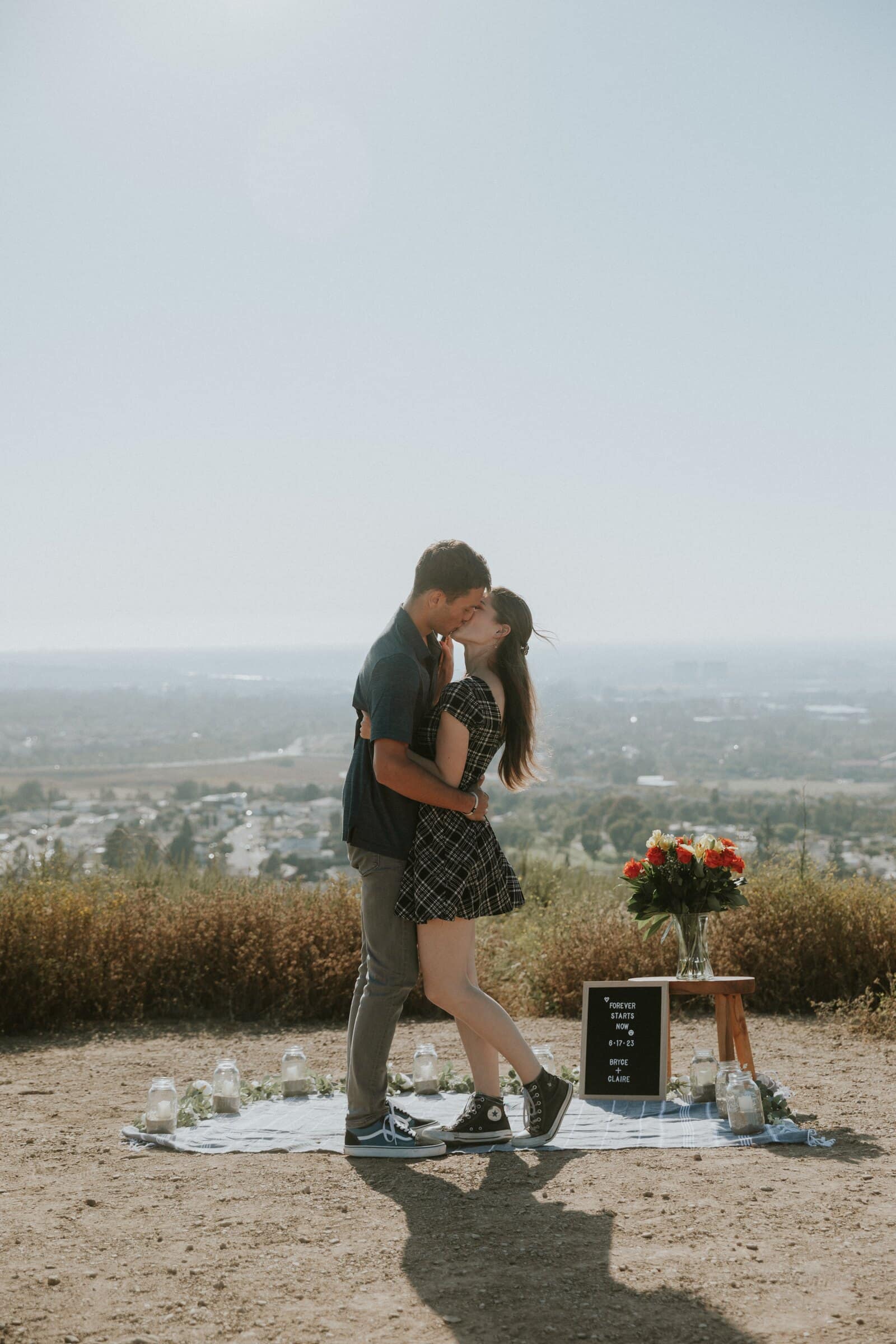 Bryce and Claire kissing just after the proposal