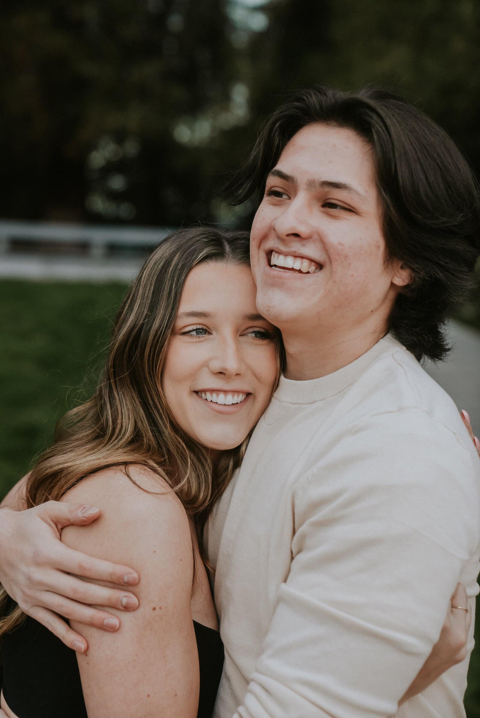Cameron and Amanda cheek to cheek, both beaming