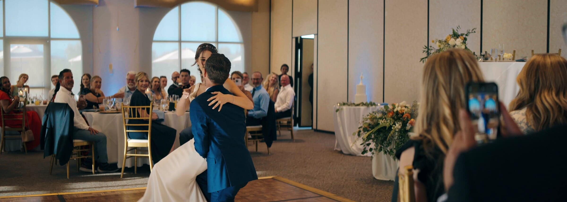 The groom dipping the bride during their first dance