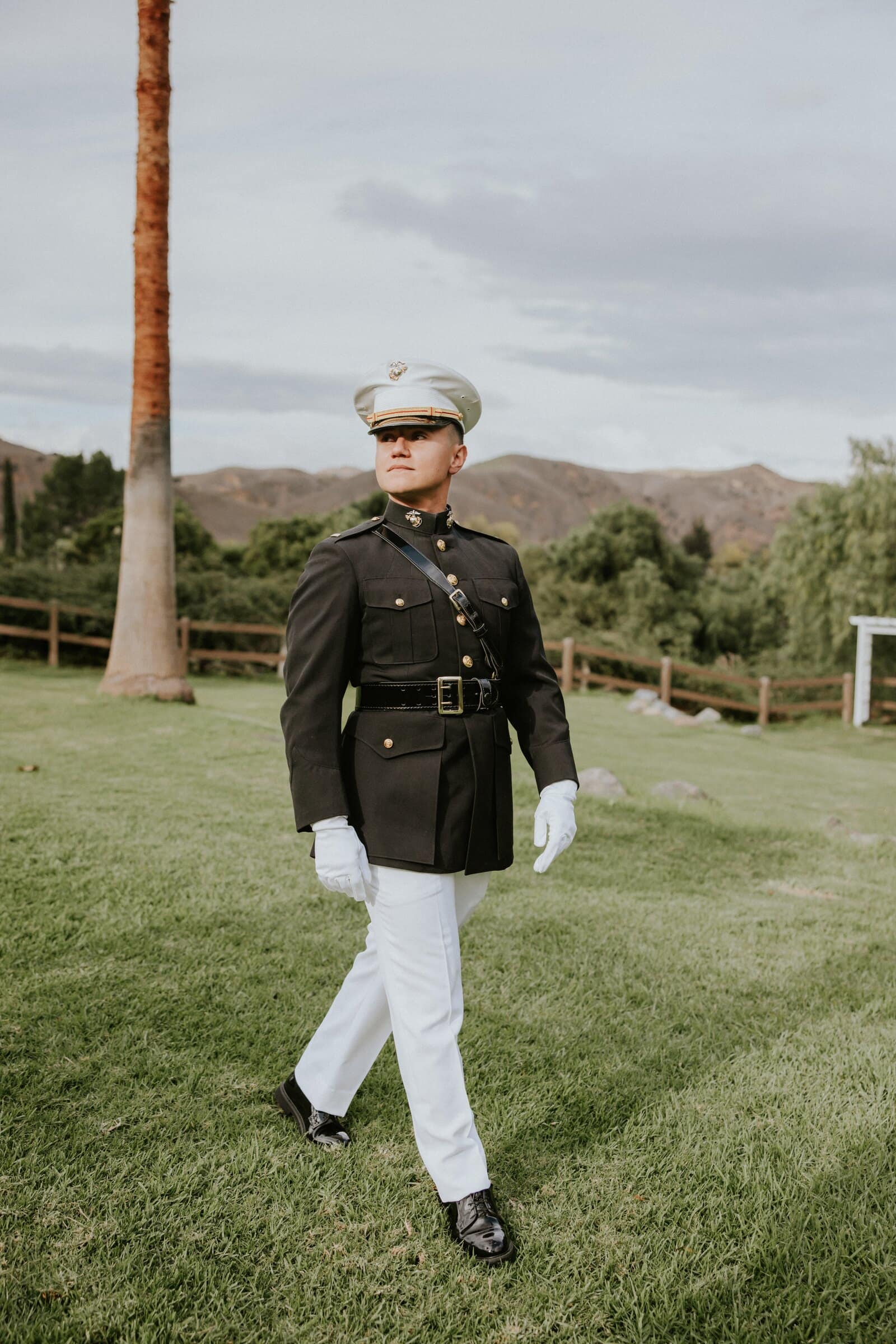 David in his Marine Corps dress blues crossing the lawn