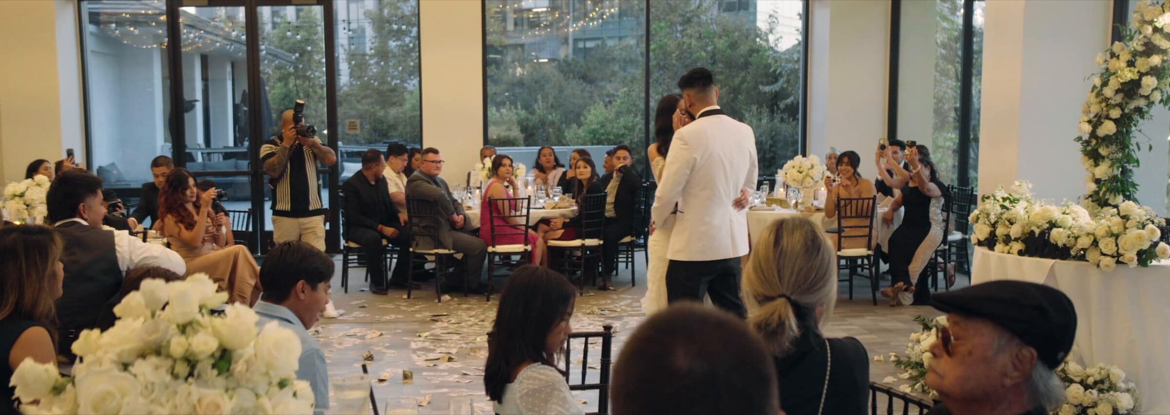 Rubi and Francis's first dance surrounded by guests